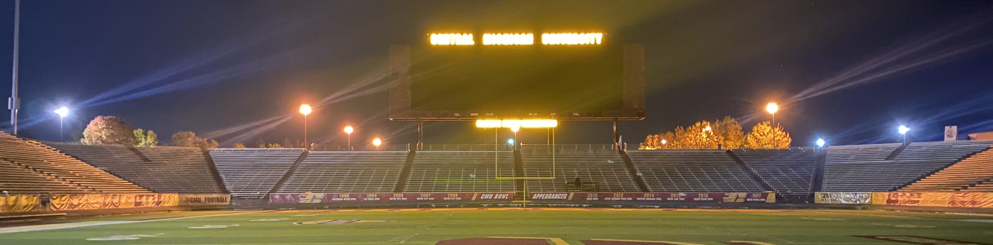 empty football stadium at night under the lights Cedar Rapids